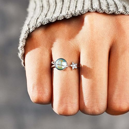 Anillo giratorio de estrella y luna
