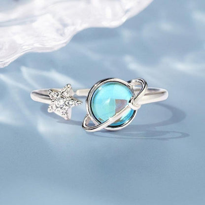 Anillo giratorio de estrella y luna